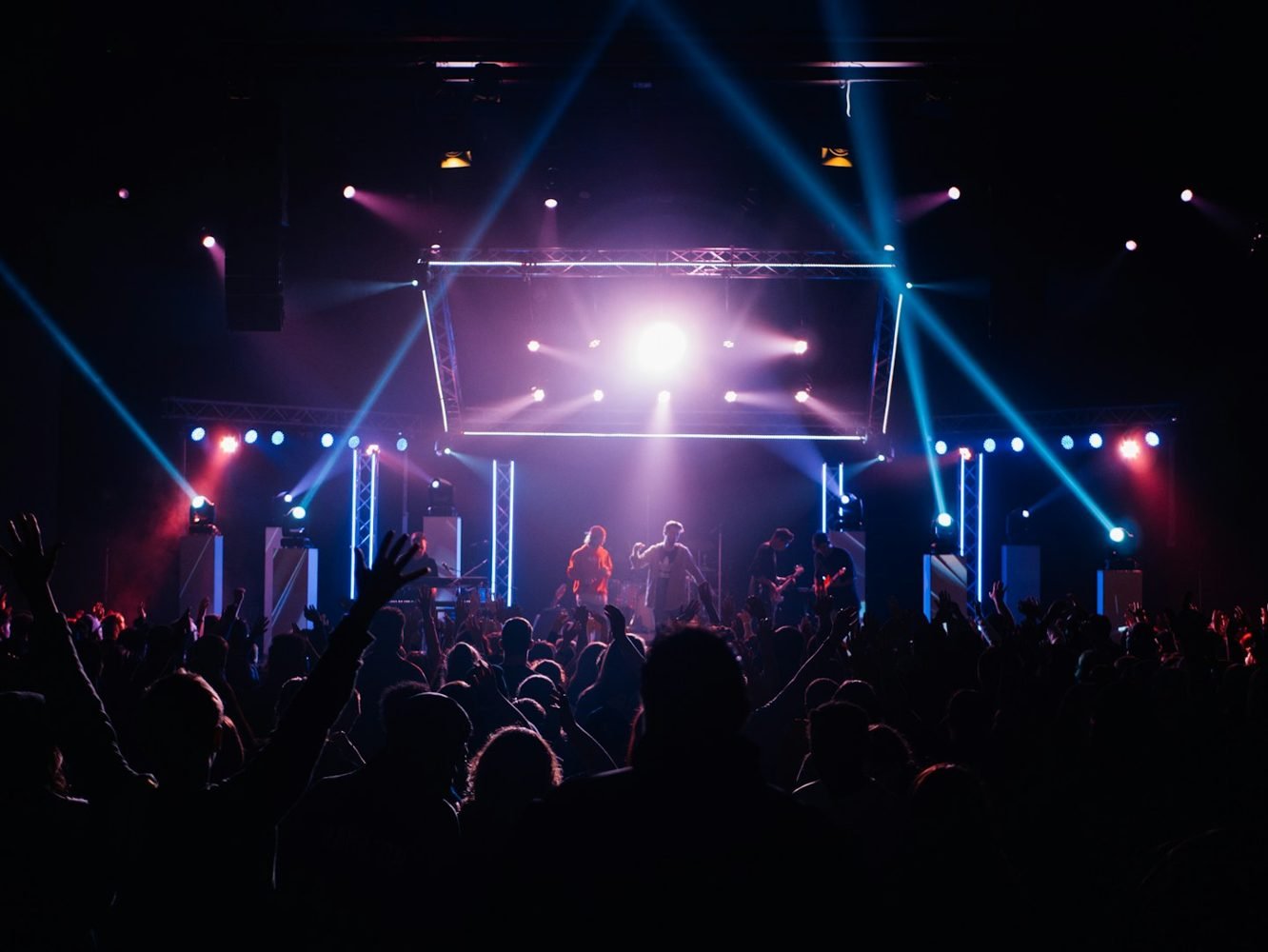 Concert crowd in a music venue; contextual editorial photograph